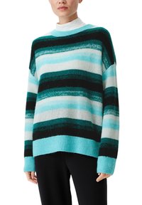 Striped sweater in shades of teal, black, and white, featuring a relaxed fit, ribbed cuffs, and a wide neckline. Soft-textured material.