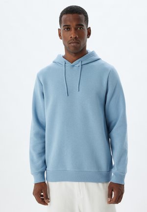 Light blue hoodie made of soft fabric, featuring a drawstring hood, long sleeves, and ribbed cuffs and hem.