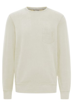 Lys beige sweatshirt lavet af blødt materiale, med rund halsudskæring, lange ærmer og en lille patchlomme på venstre bryst.