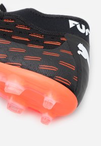Puma Botines de fútbol para terreno firme - black
