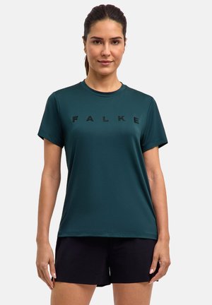 Maglietta sportiva verde scuro a maniche corte, con scollatura rotonda e logo nero "FALKE" sul davanti. Il materiale sembra liscio e leggero.
