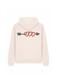 Felpa leggera color beige con tasca a marsupio. Sul retro presenta tre cuori rosse collegate da una freccia nera. Tessuto morbido e vestibilità casual.