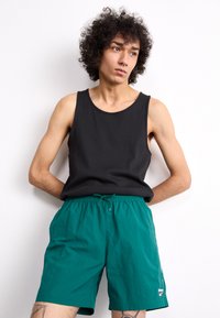 Reebok Classic CROSS CHECK - Tréningruha alsók - collegiate green