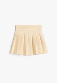 Falda plisada en beige claro, con una suave cinturilla elástica y una textura lisa, diseñada con múltiples pliegues espaciados uniformemente.