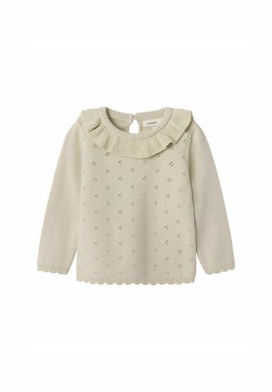 Striktrøje i lys beige med en rynket krave, der har små huller, som danner et mønster, samt bølgede kanter ved nederste kant og ærmerne. Knaplukning bagpå.