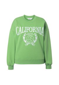 Zelená mikina s kulatým výstřihem, oversize střihem a dlouhými rukávy. Na přední straně je bílé text "CALIFORNIA" a grafika volejbalu s vavřínovými akcenty.