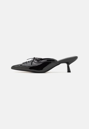 RAID SILVIA - Mules de tacón - black