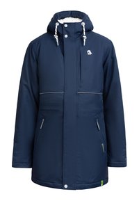 Navy blue insulated jacket with a soft inner lining, hood, front zip, two side pockets, and a logo on the chest. Features reflective details.