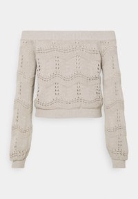 Off-shoulder beige stickad tröja med vågigt mönster, ribbade ärmslut och nederkant. Har öppet arbete över hela kroppen.