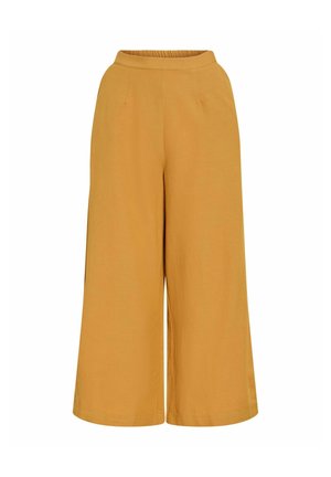 Magas derekú, széles szárú mustársárga nadrág rugalmas derékrésszel és elülső zsebekkel, borjúközépig érő, könnyű anyagból készült.