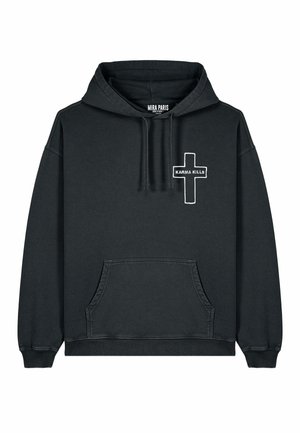 Black hoodie made of soft fabric featuring a front pocket, ribbed cuffs, and a white cross with "KARMA KILLS" text on the chest.