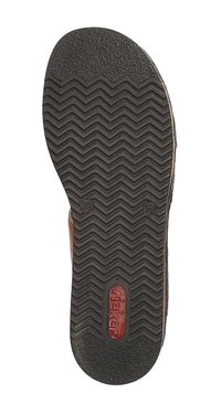 Semelle de chaussure en caoutchouc noir avec un motif de bande de roulement en zigzag, marquée de la taille 38, présentant un accent de logo rouge et des bords lisses.