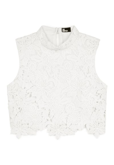Top court sans manches en dentelle blanche avec des motifs floraux, col montant et fermeture éclair au dos de la marque The Kooples.