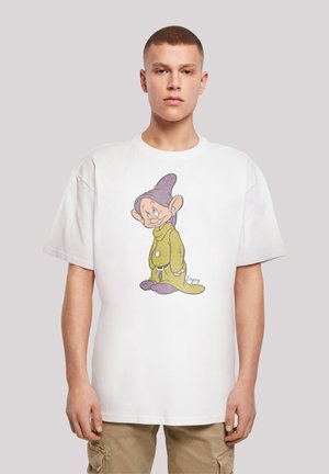 White cotton t-shirt featuring a cartoon character with a purple hat and green outfit. The design is printed on the front. Short sleeves.