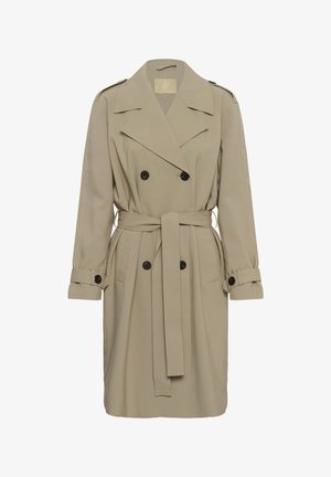 Trench-coat beige avec une coupe croisée, des boutons noirs et une ceinture à la taille. Caractéristiques : grands revers et poignets retroussés.