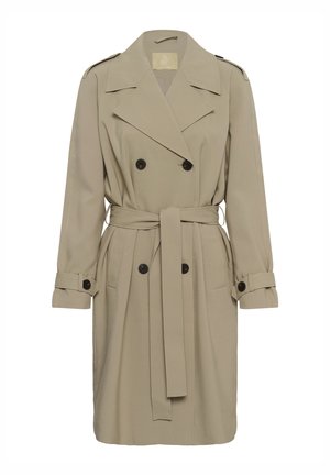 Bež nadvložek z dvorednim zapenjanjem, črnimi gumbi in pasom v pasu. Ponaša se z velikimi ovratniki in zavihanimi manšetami.