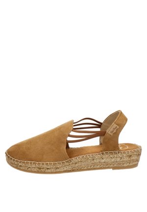 Brune ruskindsespadrille med lukket tå, åben ryg og krydsende stropper. Har en flettet jutesål og flad design.