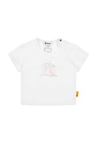 Camiseta blanca de algodón con mangas cortas, que presenta una ilustración de un perro marrón claro y detalles en rosa. Incluye una etiqueta en el costado y un cierre con botón.