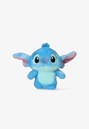 Piccolo peluche blu con grandi orecchie, grandi occhi neri e pancia di un azzurro più chiaro, in piedi su uno sfondo bianco.