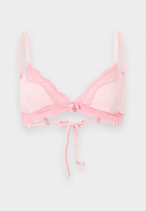 Helepunane pitsiga ääristusega rinnahoidja, reguleeritavate rihmade ja ees nööriga kinnitusega, ühtlasel taustal.