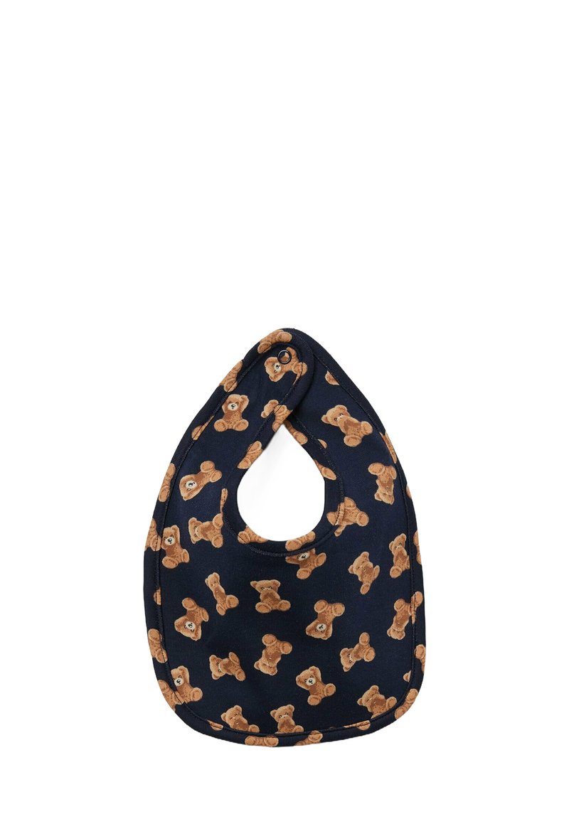 Námořnický modrý bryndák vyrobený z bavlny s opakujícím se vzorem medvídků. Zaoblený vrchní okraj s kulatým otvorem pro snadné navlékání.
