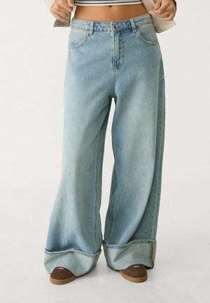 WIDE-WITH TURN-HEMS - Jean flare - light blue denim