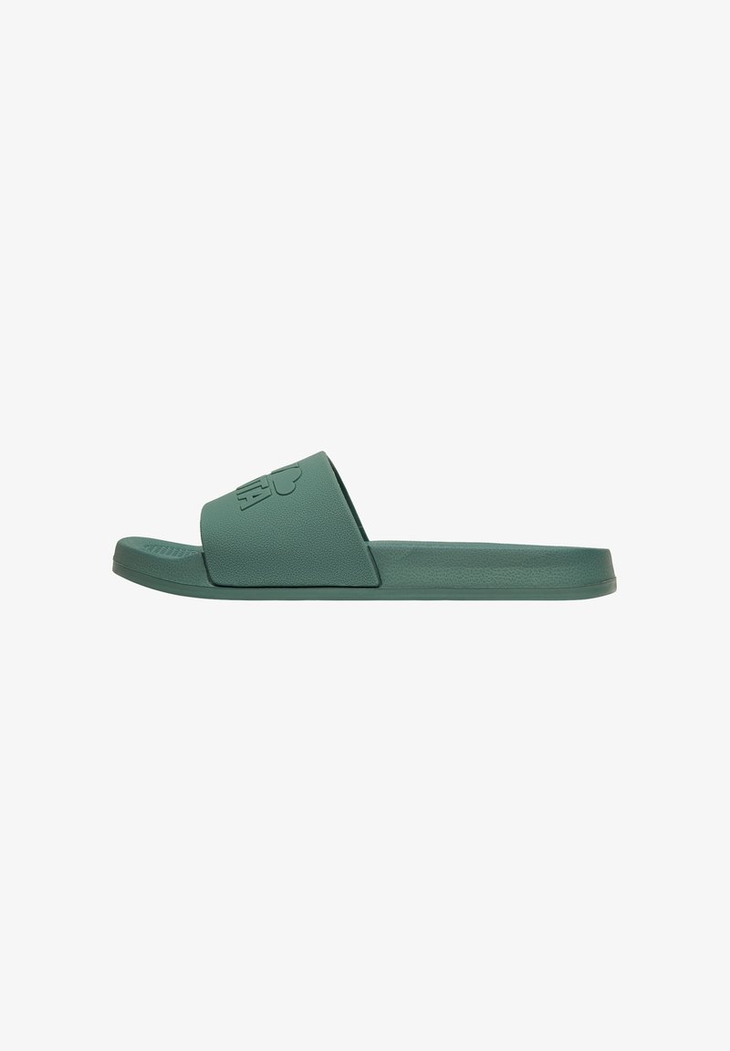 Green slide sandals made of textured rubber, featuring a wide strap with a logo detail. Flat sole with a smooth finish.
