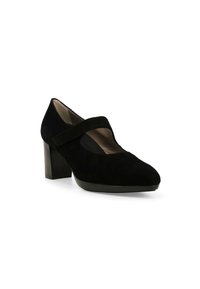 Scarpa nera in suede con tacco, punta rotonda e una fascia larga sul collo del piede. Tacco largo e blocco con interno liscio.