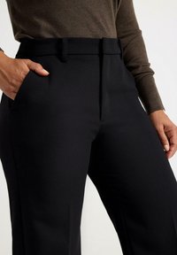 Lindex WITH SHORTER LEGS - Chinos - black