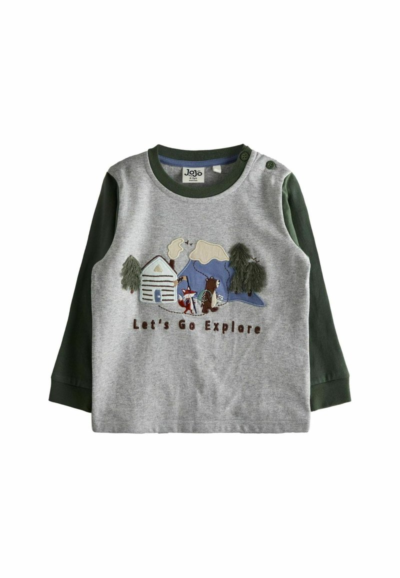 Hallitus halli pika varrukaga särk roheliste varrukatega. Esiküljel on välja tikitud looduse stseen, kus on karu, rebane, maja ja tekst "Lähme avastama". Pehme puuvillane kangas.