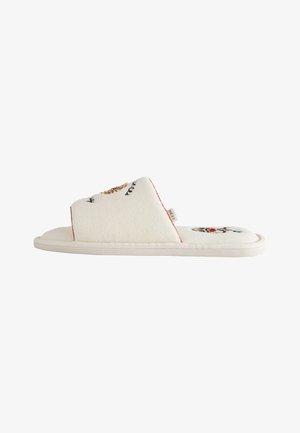 Off-white offene Hausschuhe mit besticktem Blumenmuster und rotem Besatz, flacher Sohle und einem kleinen Stoffetikett an der Seite.