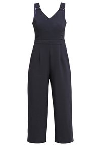 Combinaison noire sans manches avec larges bretelles, col en V, taille cintrée et pantalon large coupé court.