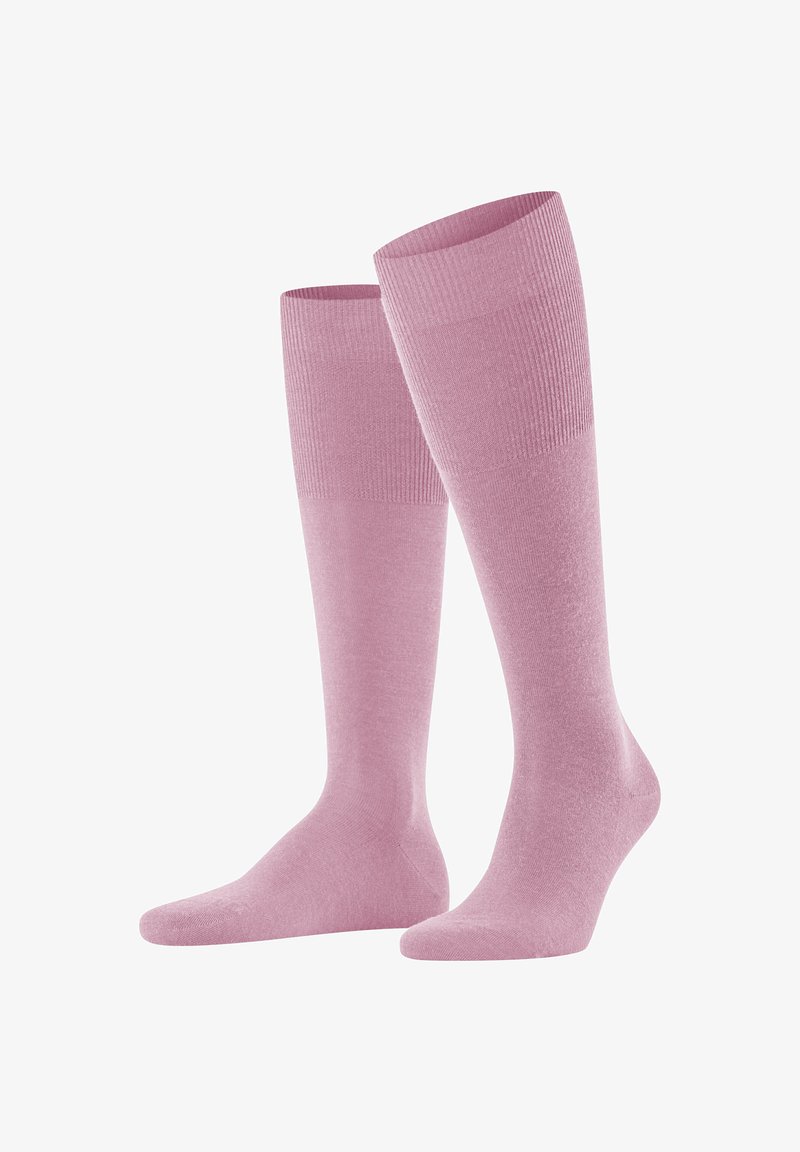 Helle rosa kniehohe Socken aus weichem, dehnbarem Material mit einem gerippten Design am oberen Rand und einem glatten Körper.