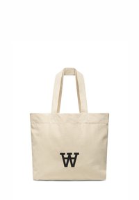 Kangas kott, off-white värvusega, kahe tugeva käepidemega. Keskmes on must logo trükk ja struktureeritud ristküliku kujuline disain.