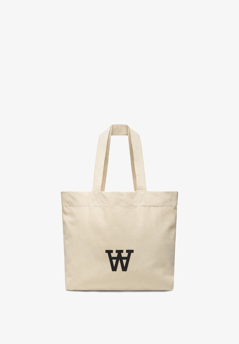 Sac en toile, écru, avec deux poignées solides. Présente un imprimé logo noir central et une forme rectangulaire structurée.