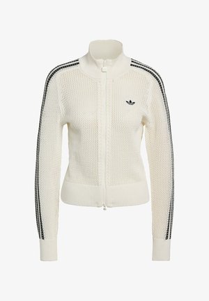 White knitted zip-up jacket with high collar, featuring black three-stripe accents on sleeves and small black logo on the chest.
