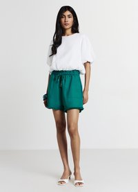 Calliope Pantaloni sportivi - verde petrolio