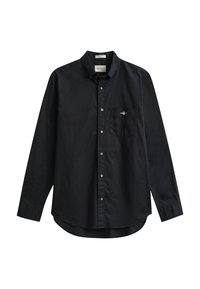 Chemise noire à manches longues, boutonnée, avec une poche poitrine ornée d’un petit logo brodé et un col à boutons.
