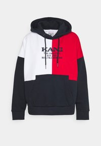 Felpa con cappuccio a blocchi di colore con sezioni rosse, bianche e blu navy. Presenta coulisse, tasca a marsupio e logo ricamato sul davanti. Tessuto in misto cotone.