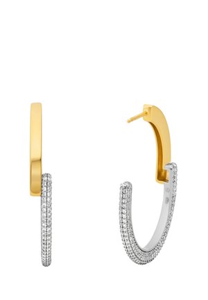 Orecchini ad anello in oro e argento con una parte superiore liscia in oro e una parte inferiore in argento impreziosita da pavè, dotati di una chiusura a chiodo sicura.