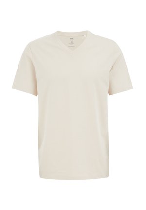 Jasnonaturalna, krótko rękawowa koszulka wykonana z miękkiej bawełny, z dekoltem w serek i prostym wykończeniem. Brak widocznych wzorów lub akcentów.