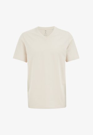 Jasnonaturalna, krótko rękawowa koszulka wykonana z miękkiej bawełny, z dekoltem w serek i prostym wykończeniem. Brak widocznych wzorów lub akcentów.