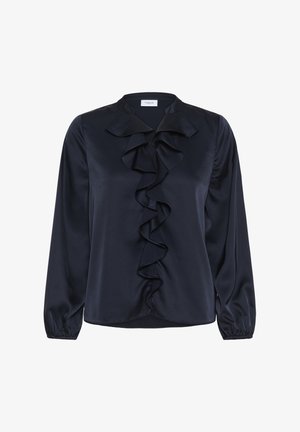 Tumesinine satiinpluus volangidega esiküljel, pikkade varrukatega, millel on kogutud mansetid, ja lamedate kraega. Sile tekstuur ja elegantne laskumine.