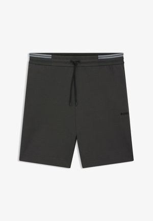 Donkergrijze sportshorts van lichtgewicht stof, met een trekkoord in de taille, zijzakken en een subtiele logodetail op het been.