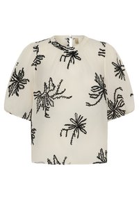 Blouse crème à manches courtes bouffantes, encolure ronde, avec motifs floraux abstraits brodés en noir.