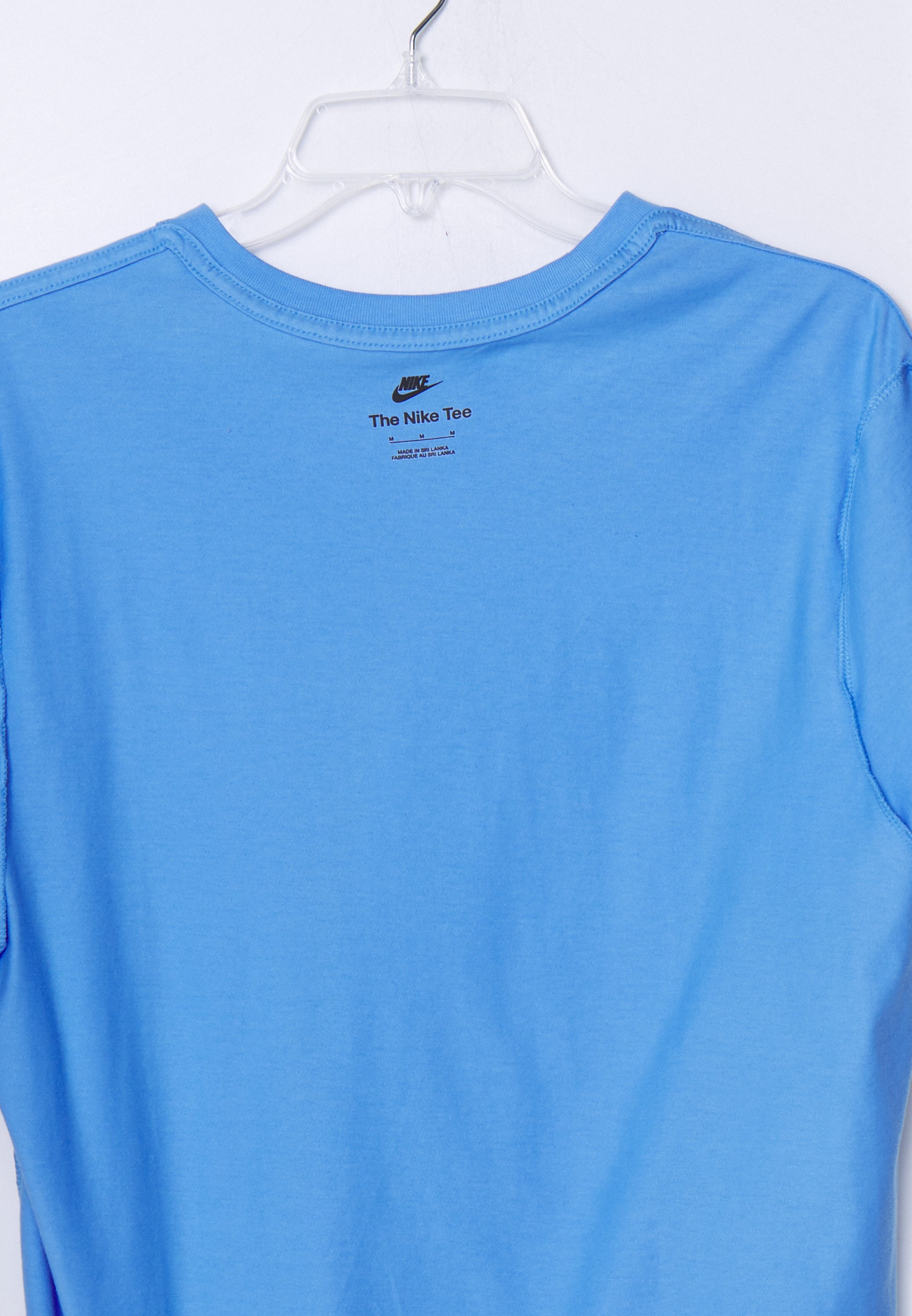 light current blue nike shirt