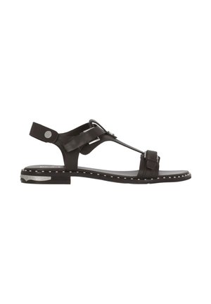 Sort flad sandal med anklerem, metalliske nitter langs sålkanten og dekorativ metal detalje på lav hæl, sidebillede.