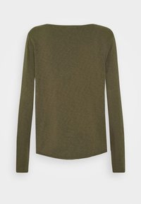 Langärmliges Hemd in Olivgrün, aus weichem Stoff. Verfügt über einen abgerundeten Ausschnitt und einen leicht geschwungenen Saum am unteren Rand.