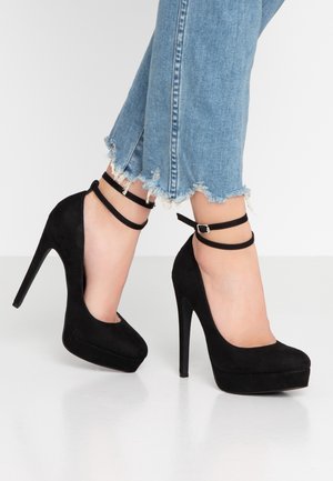 Højhælede pumps - black