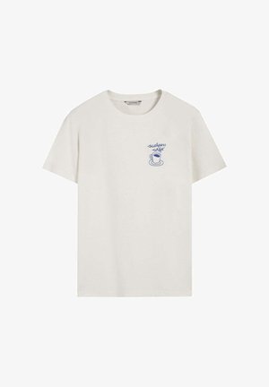 Camiseta blanca de algodón con cuello redondo y mangas cortas. Destaca un gráfico azul de una taza de café con el texto "scalpers café" en el pecho.